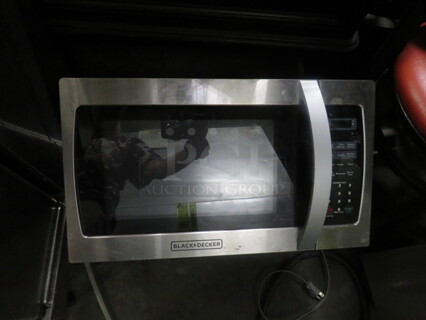 One Black And Decker Microwave With Manual. 20X15X12. 