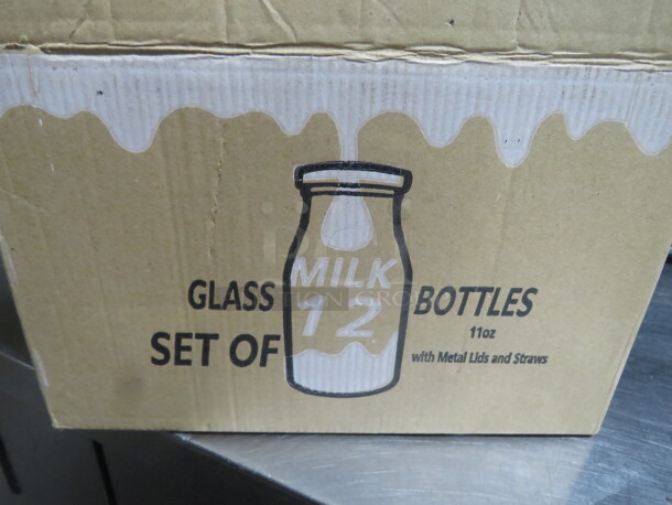 One Set Of 12 NEW Milk Bottle With Lids And Straws. 