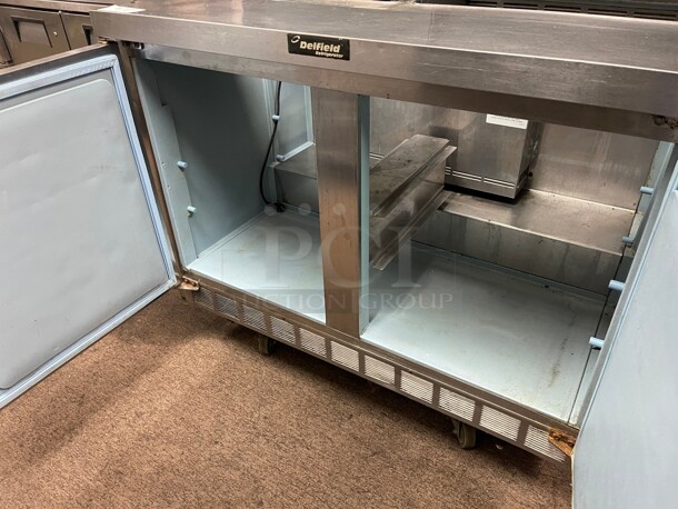 Delfield 4448NP-12 48 inch 2 Door Front Breathing Commercial Refrigerated Sandwich Prep Table with Casters 120 Volt NSF - Image 8 of 8