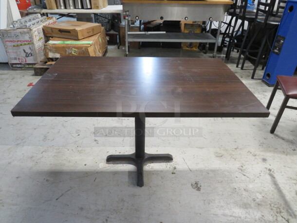 One Brown Laminate Table Top On A Pedestal Base. 48X30X29 - Image 1 of 1