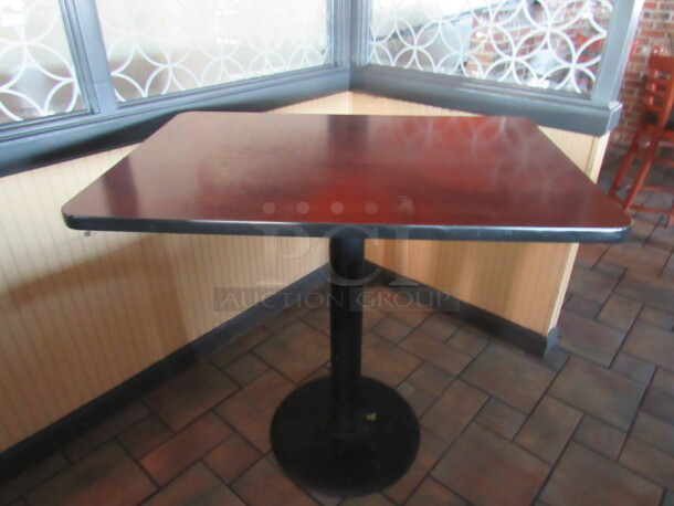 One Table With Laminate Top On A Bar Height  Pedestal Base. 44X30X41