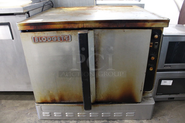 Blodgett Stainless Steel Commercial Propane Gas Powered Full Size Convection Oven w/ Solid Doors, Metal Oven Racks and Thermostatic Controls. 38x37x32.5