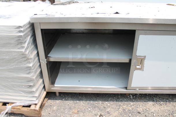 BRAND NEW SCRATCH AND DENT! Stainless Steel Commercial Table w/ Back Splash and 2 Doors.  - Image 3 of 5