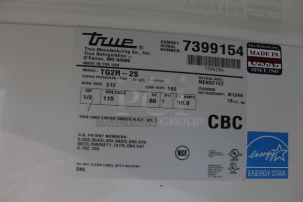 2012 True TG2R-2S ENERGY STAR Stainless Steel Commercial 2 Door Reach In Cooler w/ Poly Coated Racks on Commercial Casters. 115 Volts, 1 Phase. Tested and Working! - Image 7 of 7