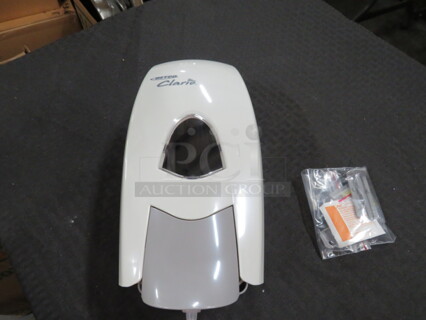 One NEW Betco Clario Soap Dispenser. 