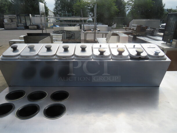 One Beverage Air 2 Door Refrigerator With 2 Racks, And A Cold Rail On Top With 9 Topping Containers And Lids And 6 Round Cylinders, On Casters. Working NOT Cold.  Model# MS68. 115 Volt. 69X28X50.5 - Image 2 of 5