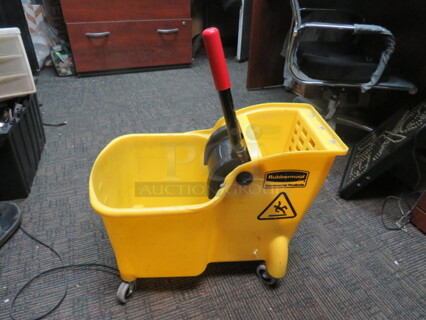 One Rubbermaid Mop Bucket And Wringer. 