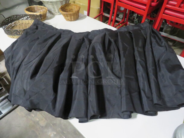 One Black Table Skirt. 144X26