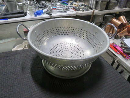 One 15 Inch Aluminum Colander.