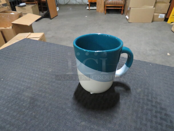 AT HOME Teal Coffee Cup. 13XBID - Image 1 of 1