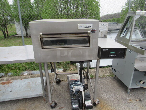 One Lincoln Impinger 1162 Pizza Oven On Casters. PARTS ONLY! 120/208 Volt. 42X36X54
