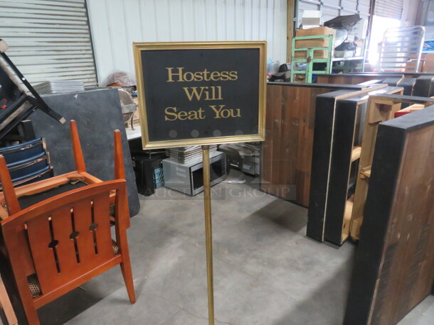 One Gold Color Sign. 15X10X60 - Image 1 of 1