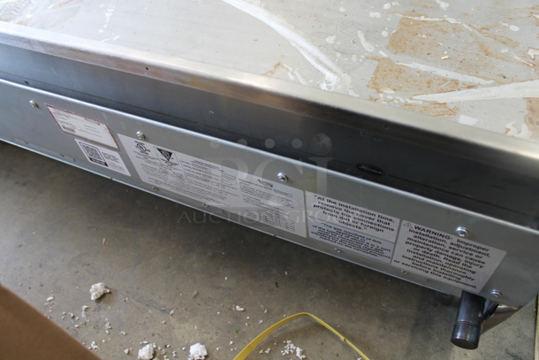 Avantco 177CAG48MG Stainless Steel Commercial Countertop Natural Gas Powered Flat Top Griddle. 120,000 BTU.  - Image 6 of 7