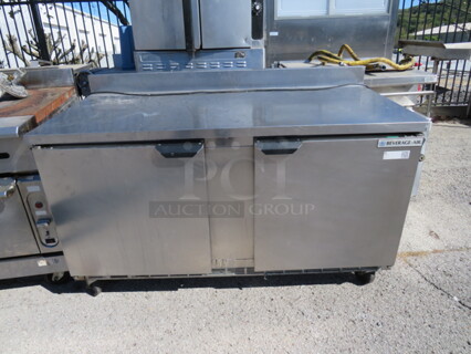 One Beverage Air 2 Door Worktop Cooler With 2 Racks On Casters. #WTR60AHC-F15. 115 Volt. 60X29X39.5