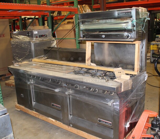 AWESOME! Garland Natural Gas 6 Burner Range With 2 Full Size Ovens, Stock Pot Rings,Storage Space And Garland Salmander. 83x38x67.5. Working When Pulled!