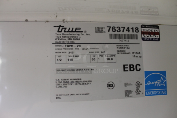 2013 True TG2R-2S ENERGY STAR Stainless Steel Commercial 2 Door Reach In Cooler w/ Poly Coated Racks on Commercial Casters. Tested and Working! - Image 7 of 7