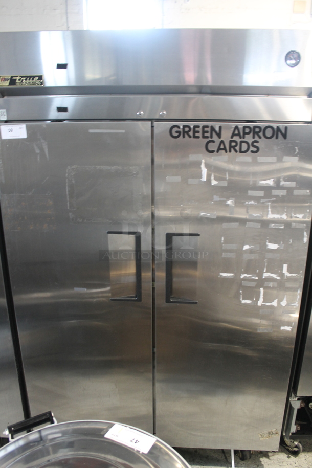 2015 True TG2R-2S ENERGY STAR Stainless Steel Commercial Two Door Reach In Cooler w/ Poly Coated Racks on Commercial Casters. 115 Volts, 1 Phase. Tested and Working! - Image 1 of 7