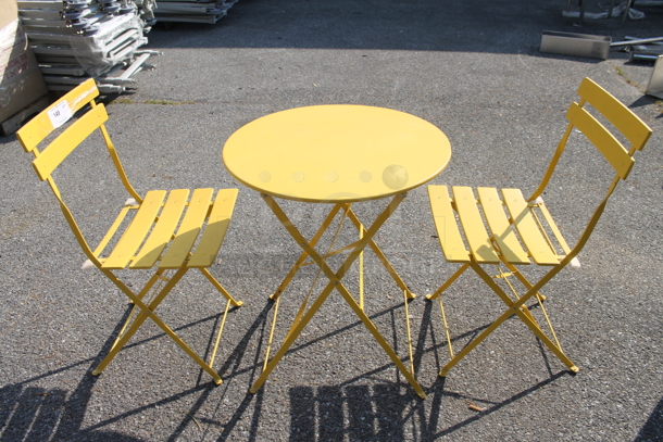 Yellow Metal Round Folding Table and 2 Yellow Metal Folding Chairs. 23.5x23.5x27.5, 16.5x14.5x32 - Image 1 of 5