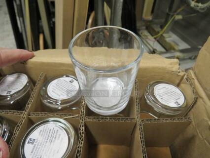 One NEW Lot Of 23 Glass Candle Holders.