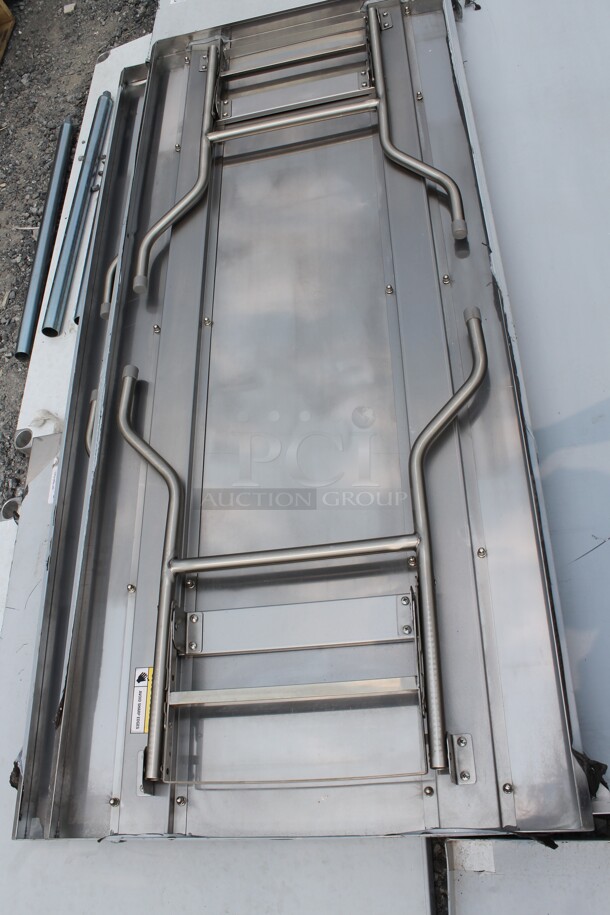 BRAND NEW SCRATCH AND DENT! Regency 600FWT3072 Commercial Stainless Steel Open Base Folding Work Table - Image 4 of 4