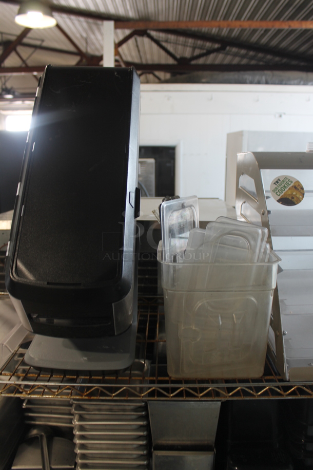 ALL ONE MONEY! Lot of 3 Tiers Worth of Various Items Including Poly Cookie Merchandiser, Drop In Bins and Printer. Does Not Include Shelving Unit.  - Image 4 of 11