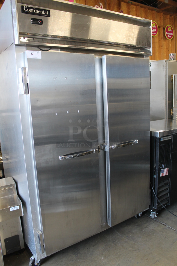 2010 Continental 2F Stainless Steel Commercial 2 Door Reach In Freezer on Commercial Casters. 115 Volts, 1 Phase. Tested and Working!