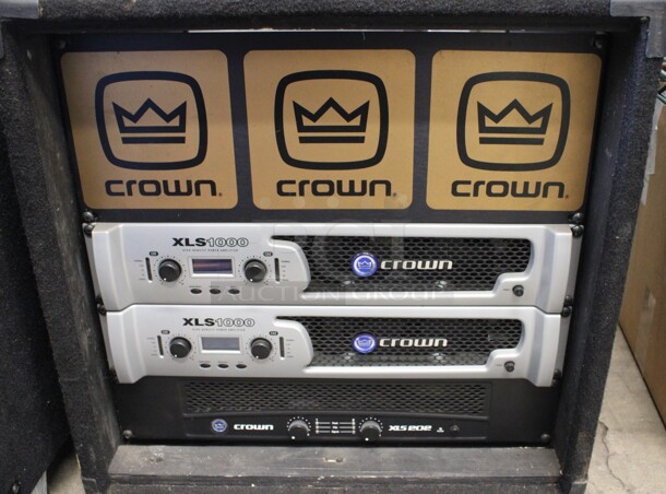 Two Crown XLS1000 High Density Power Amplifiers and Crown XLS202 Amplifier in Case. 21x22x21