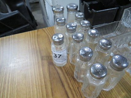One Lot Of 13 Assorted Salt/Pepper Shakers.