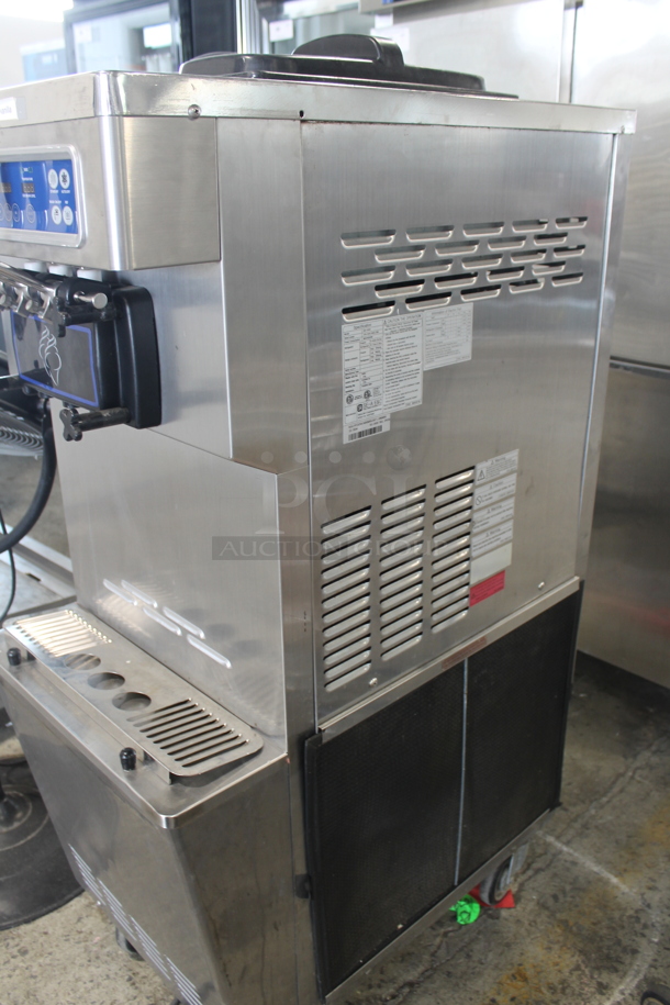 SSI-203S Stainless Steel Commercial Air Cooled Floor Style 2 Flavor w/ Twist Soft Serve Ice Cream Machine on Commercial Casters. 220 Volts, 1 Phase. - Image 7 of 11