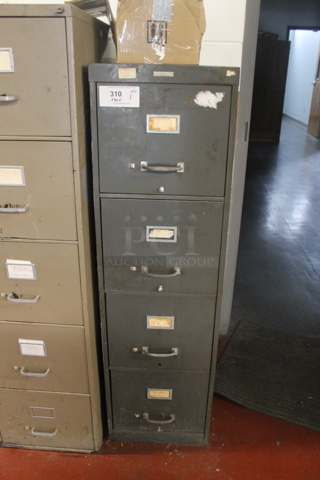 Gray 4 Drawer Metal Filing Cabinet. BUYER MUST REMOVE.