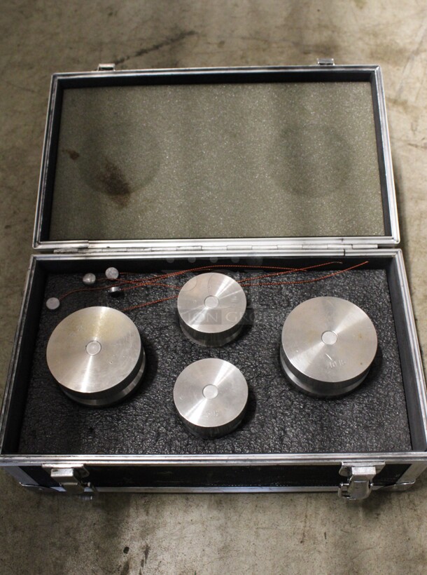 Hard Case of 4 Metal Weights; Two 10 Pound and Two 5 Pound. 13.5x8x6.5