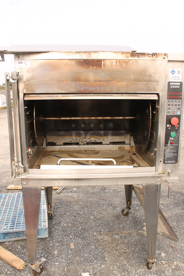 Hardt Inferno 3500 Stainless Steel Commercial Floor Style Natural Gas Powered Rotisserie Oven w/ Metal Legs on Commercial Casters. Missing Glass Door. - Image 1 of 6