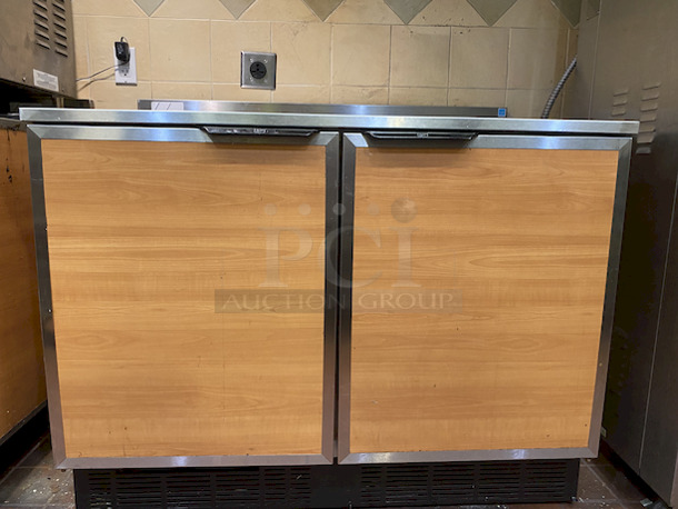 10 out of 10! Duke RUF-48 M 2 Door Refrigerated Work Counter on Commercial Casters. 120volt

Tested. Perfect Working Order. 

30"d x 48"w x 36-1/2"h. 
 - Image 3 of 6
