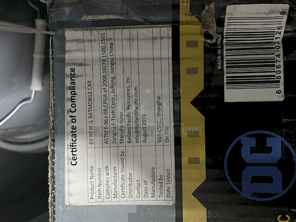 NEW/NEVER USED - DC Batmobile Car, Model: EC-1710-GC – Authentic Batman Design6v Electric Ride-On ; Forward & Reverse Drive; Flashing Blasters; Engine Starting Sound; (5) Unique Sounds: Fire Blasters – Start Up – Afterburner – Shield – Night Vision. Top of box is open, all parts appear to be in the box in original packaging.  - Image 2 of 3