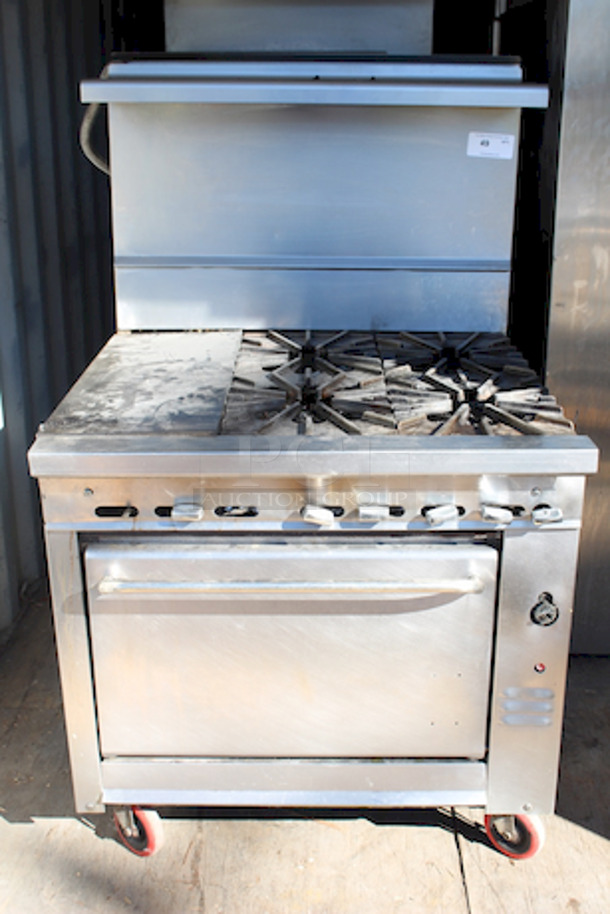 AWESOME! Montague Combination (2) Burner Griddle Top With (4) Burner Range On Oven Base With Commercial Casters 35x36-1/2x60. - Image 1 of 8