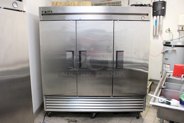 LIKE NEW!! True T-72 - Reach-In Refrigerator - Three Door - 72 Cu. Ft., On Commercial Casters, In PERFECT WORKING ORDER!!