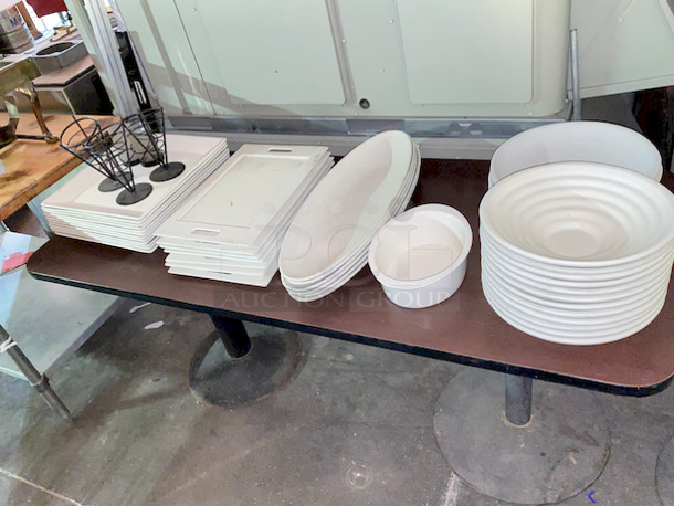 Table Full of High Quality Ceramic Platters, Includes Table Top and Bases. 

