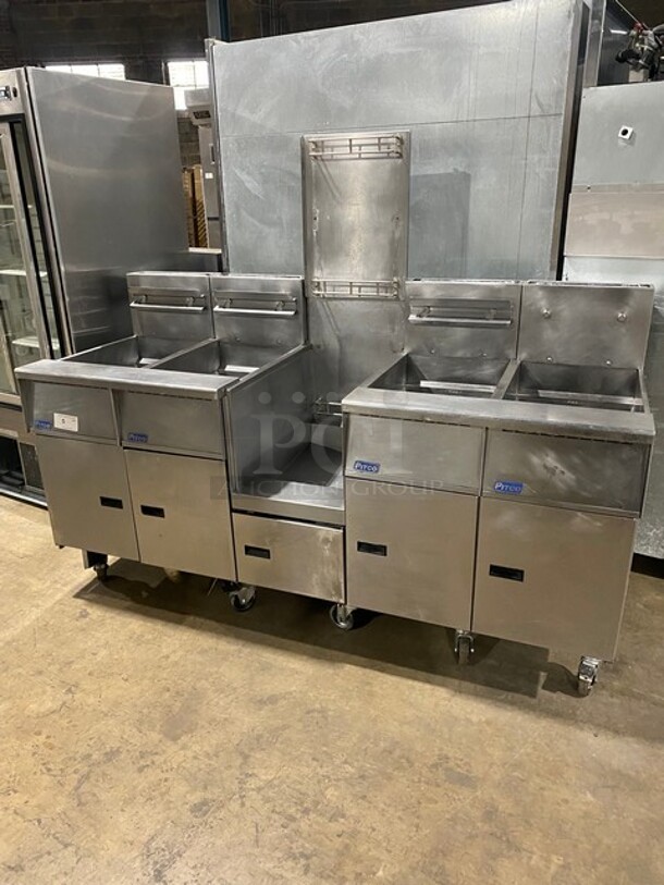 FAB! Pitco Frialator Commercial Natural Gas Powered 4 Bay Deep Fat Fryer! With Middle Fryer Basket Rack! With Oil Filter System! All Stainless Steel! On Casters! Model: SGH50 SN: G10DA010387