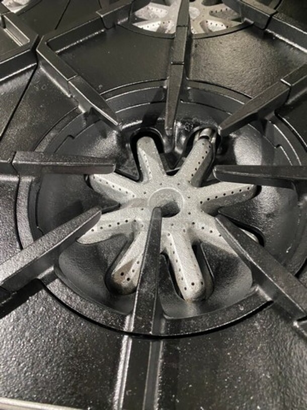 GREAT FIND! Garland Commercial Gas Powered 6 Burner Stove With Right Side Flat Griddle! Griddle Has Side Splashes! With Raised Back Splash And Salamander Shelf! With 2 Oven Underneath! Metal Oven Racks! All Stainless Steel! On Casters! - Image 8 of 11