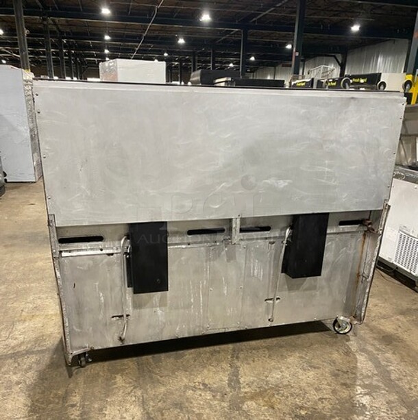 Garland Commercial Natural Gas Powered 12 Burner Stove! With 2 Full-Sized Ovens! With Metal Oven Racks! With Raised Back Splash & Salamander Shelf! Stainless Steel! On Casters! - Image 3 of 9