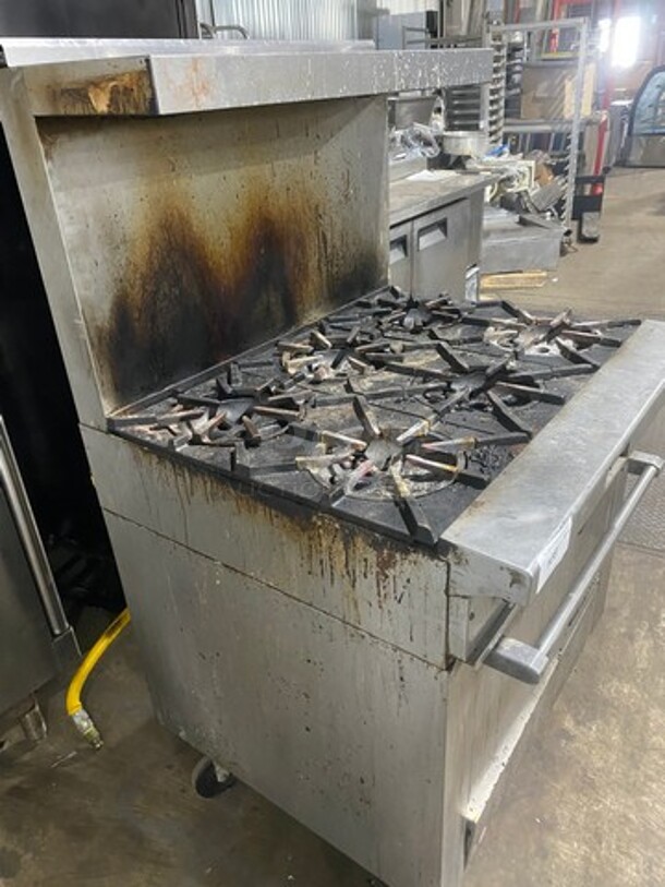 Garland Commercial Natural Gas Powered 6 Burner Stove! With Raised Backsplash & Overhead Salamander Shelf! With Convection Oven Underneath! All Stainless Steel! Model H286RC Serial 0303RG0779! On Casters! WORKING WHEN REMOVED! - Image 4 of 12