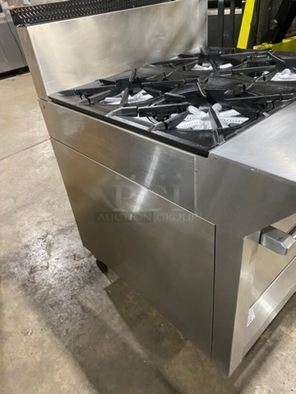 Garland Commercial Natural Gas Powered 4 Burner Stove! With Back Splash! With Oven Underneath! Metal Oven Rack! All Stainless Steel! On Casters! Model: 144R SN: 1601100100589 - Image 3 of 10