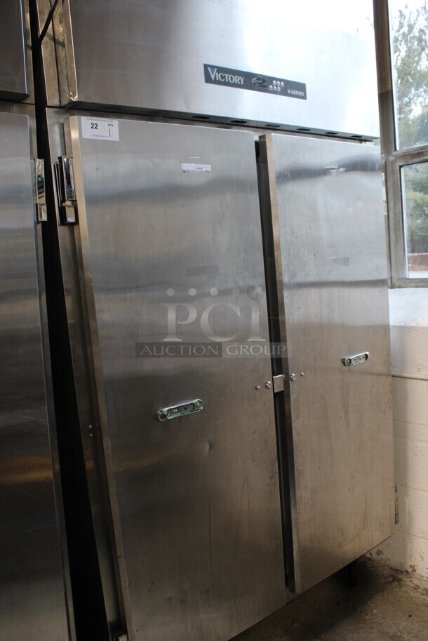 2013 Victory Model VF-SA-2D Stainless Steel Commercial 2 Door Reach In Freezer w/ Poly Coated Racks on Commercial Casters. 115 Volts, 1 Phase. 52x34x84. Tested and Working!