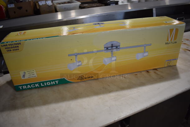 4 IN ORIGINAL BOX! Mul-T-Lite Metal Track Lighting Fixture. 4 Times Your Bid! - Image 1 of 4