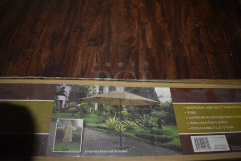 BRAND NEW IN BOX! Khaki Patio Umbrella. 13'. (lounge)