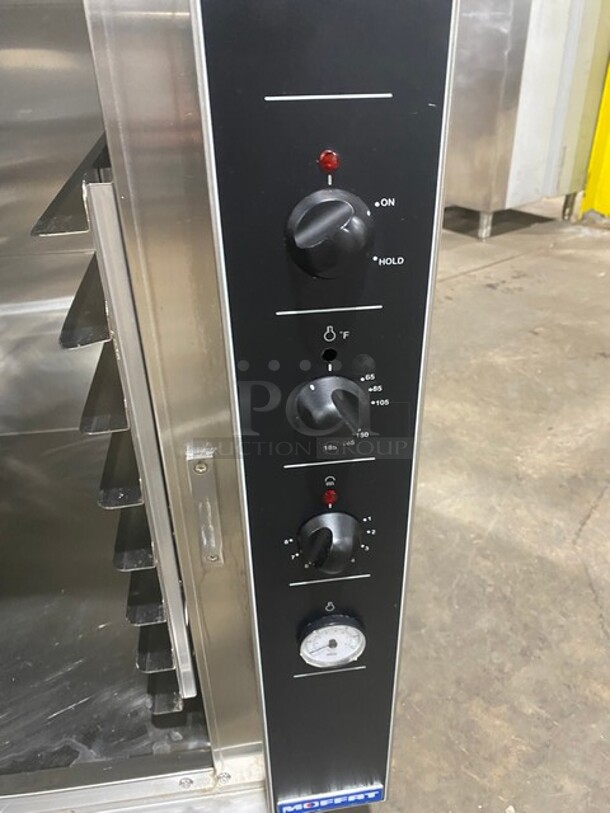 WOW! Moffat Turbofan - Full Size Sheet Pan Manual Electric Proofer And Holding Cabinet! P Series! 8 x full size sheet pan capacity 3" tray spacing Low velocity circulation fan Off / proofer / hold mode selection dial Mechanical thermostat 65-185F Air heating ON control panel indicator Humidity level control Humidity tank ON control panel indicator Cabinet temperature thermometer Auto-fill water system standard Single phase connection! Model: P8M SN: 1667319 - Image 6 of 8