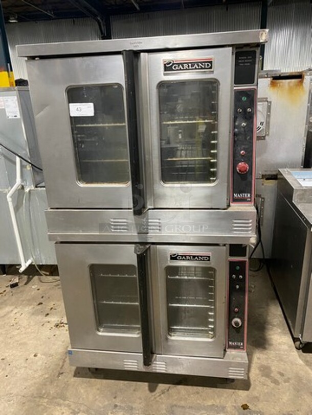 Garland Commercial Gas Powered Double Deck Convection Oven! With View Through Doors! Metal Oven Racks! All Stainless Steel! On Casters! 2x Your Bid Makes One Unit! - Image 1 of 9