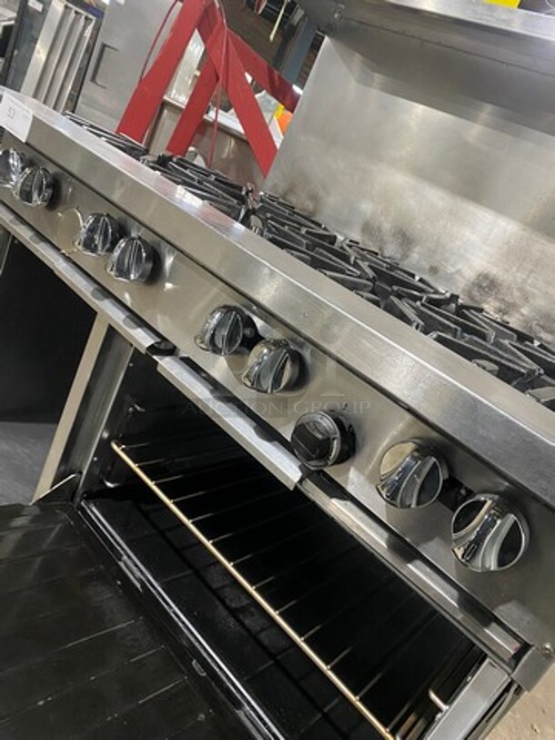 Great! US Range Commercial Natural Gas Powered 8 Burner Stove! With Raised Back Splash And Salamander Shelf! With Oven Underneath! All Stainless Steel! On Casters! Working When Removed! - Image 8 of 9
