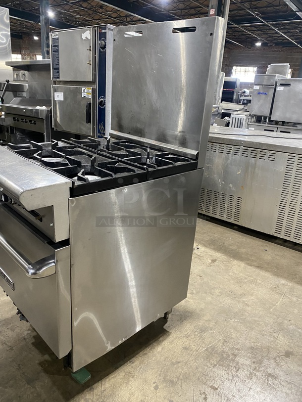 American Range Commercial Natural Gas Powered 4 Burner Stove! With Raised Back Splash! With Full Size Oven Underneath! All Stainless Steel! On Legs!
 - Image 3 of 8