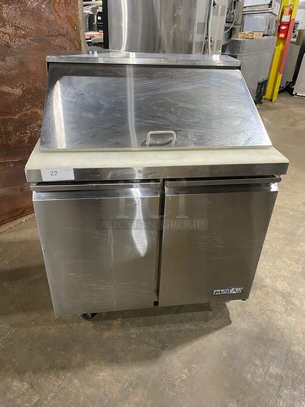 Motak Commercial Refrigerated Sandwich Prep Table! With Commercial Cutting Board! With 2 Door Storage Space Underneath! All Stainless Steel! On Casters!
